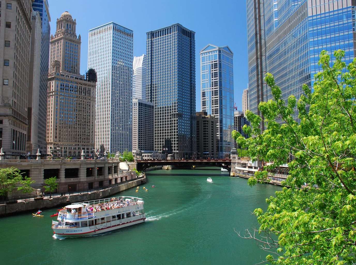 Luxury Trip to Chicago - River encased with glass buildings and skyscrapers