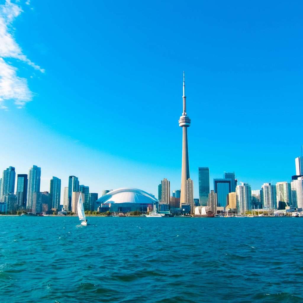 Luxury Holidays to Toronto - City view and ocean with toronto tower