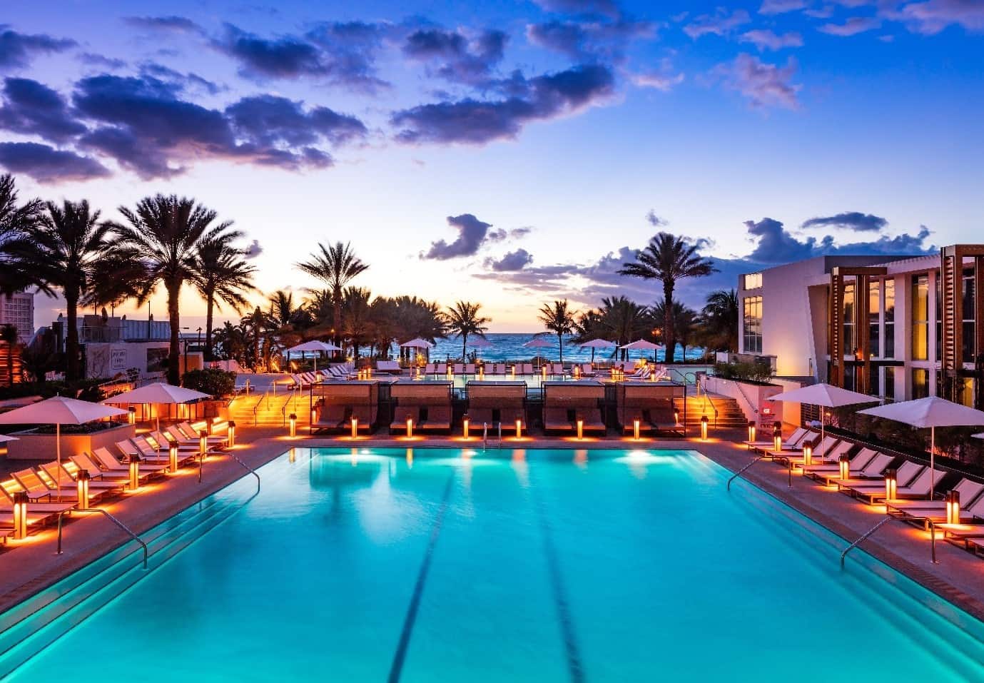View of the swimming pool in the evening at Eden Roc Miami Beach Resort in Florida