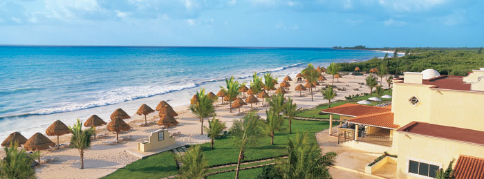 Aerial view of the beach and resort at Secrets Capri Riviera Cancun in Mexico