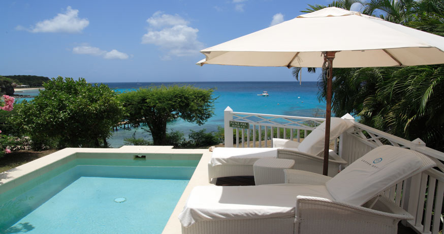 View of the private swimming pool at The Cotton House in Mustique