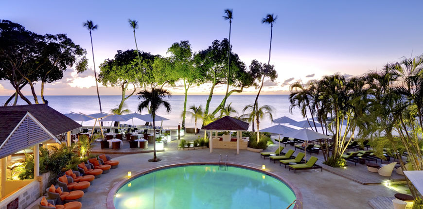 View of the swimming pool and the beach at Tamarind by Elegant Resorts in Barbados