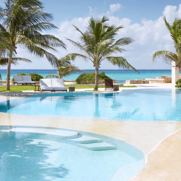 View of the swimming pools at Viceroy Riviera Maya in Cancun, Mexico