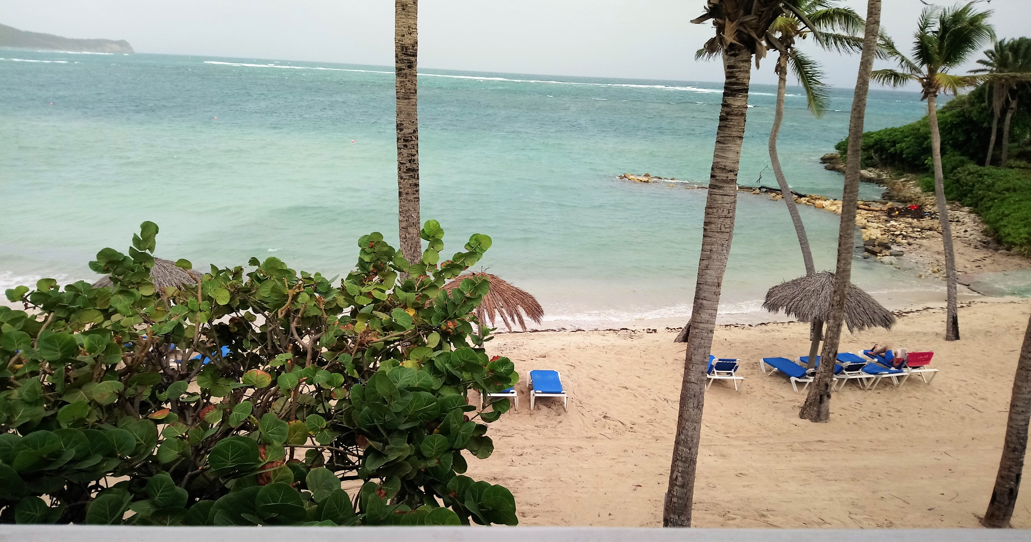 Balcony view of Coco Beach from a Beachfront Room at St James Club Antigua