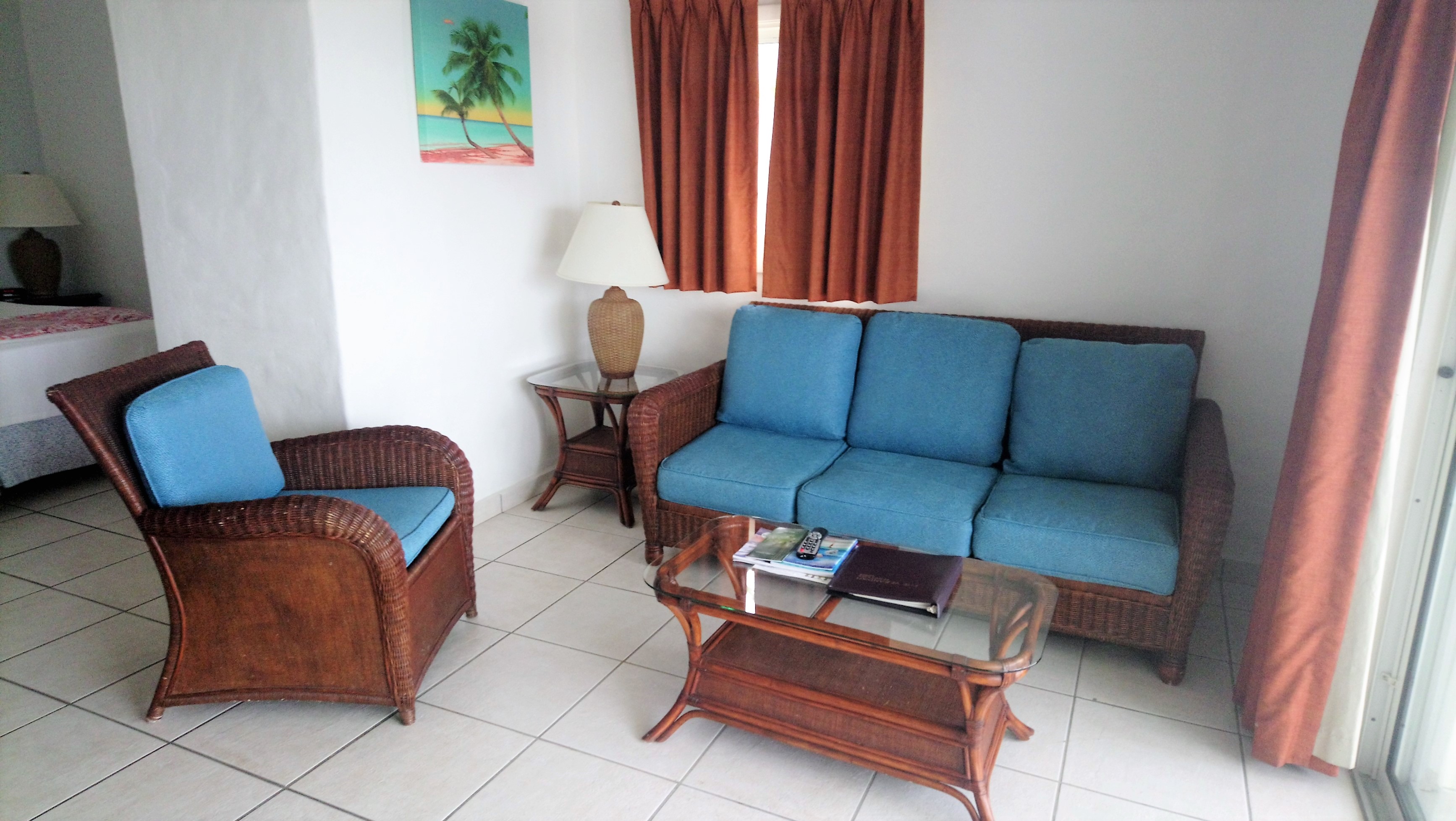 View of the living area in a Wwaterview Suite at The Verandah Resort Antigua