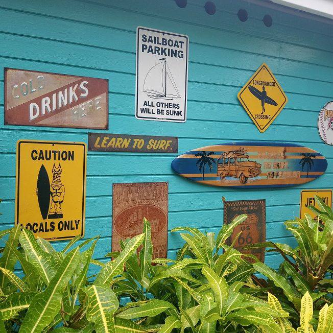 Signs on the side of the Rasta Bar at The Verandah Resort in Antigua