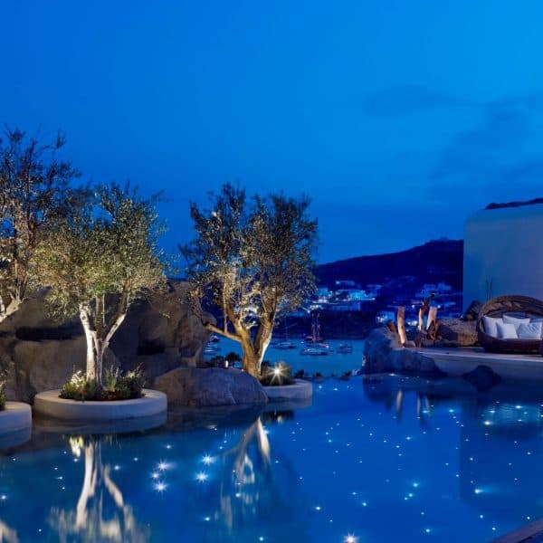 View of the swimming pool at night at Kensho Boutique Hotel in Mykonos, Greece