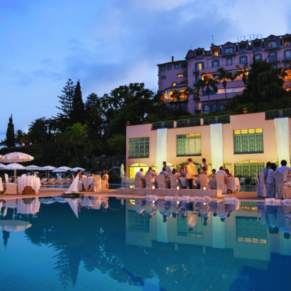 Dining by the pool at Belmond Reids Palace in Madeira